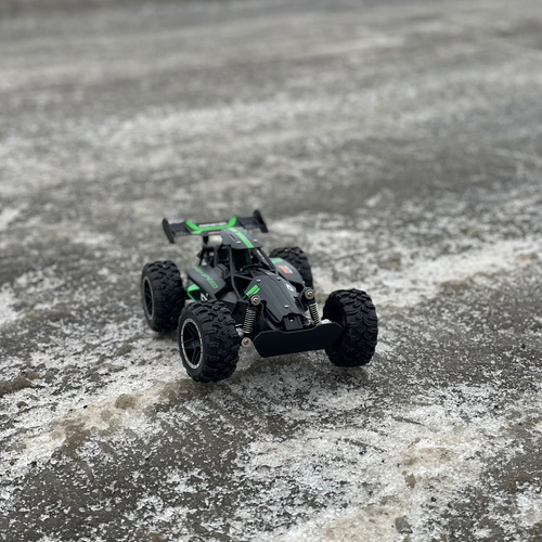 Fast Remote-Controlled Car with Durable Construction and 4 Shock Absorbers (WNDR24819) - Image 2